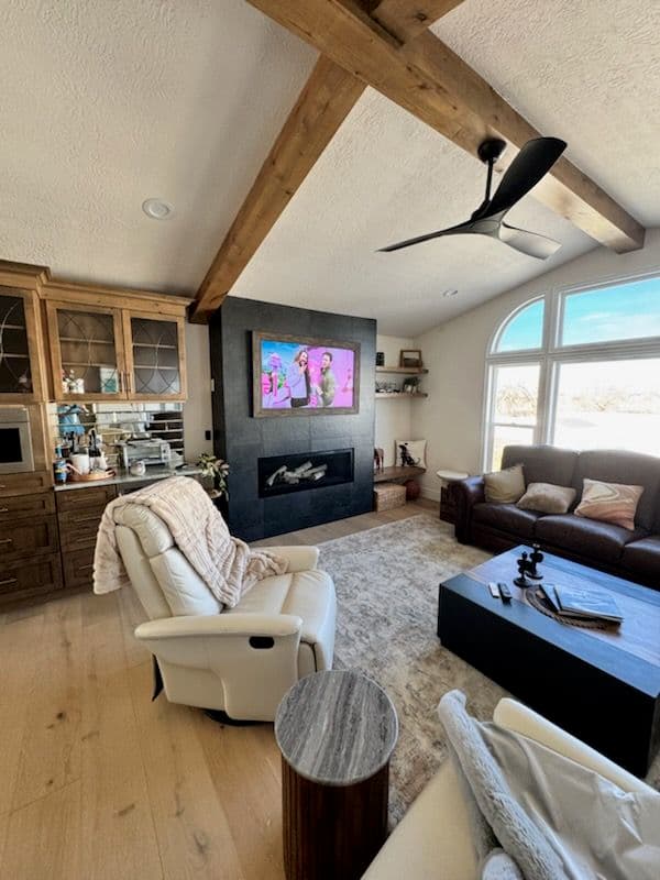 Project Custom Living Room Transformation with Fireplace and LED Shelves image